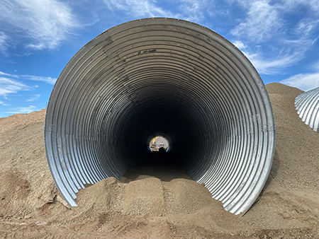 A pair of tunnels will allow light vehicles to access parts of the mine while bypassing an isolated autonomous zone where driverless trucks will be tested. 